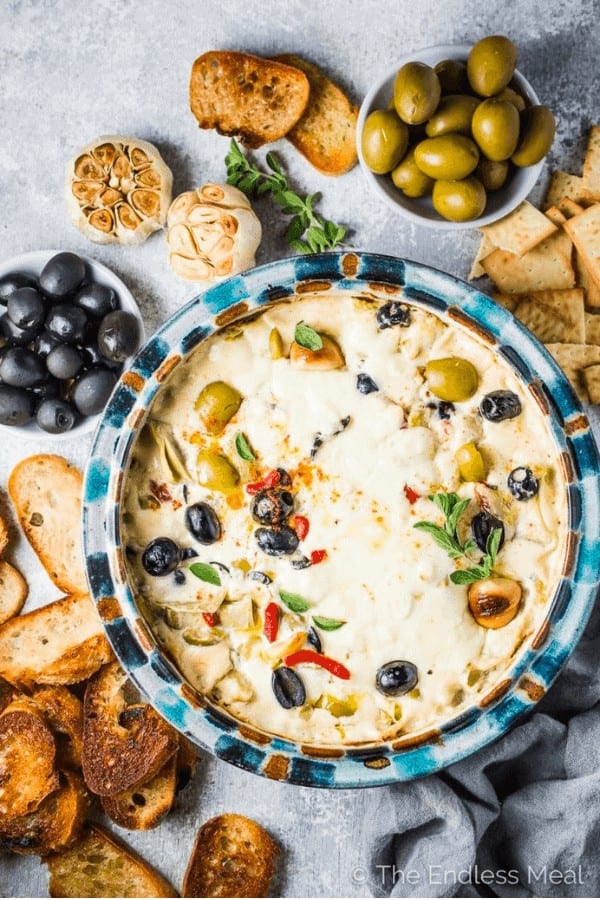 Cheesy Roasted Garlic Artichoke Olive Dip