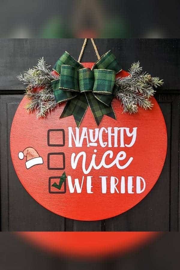 NAUGHTY OR NICE DOOR HANGER