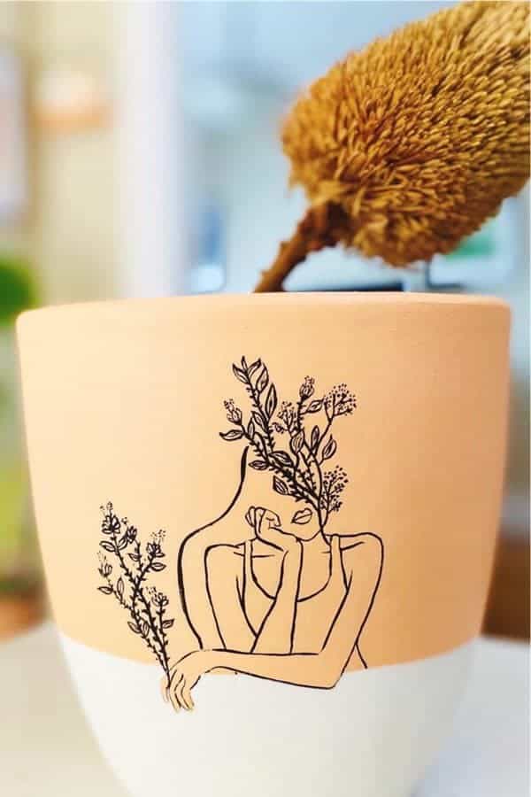 Feminine Painted Clay Pot