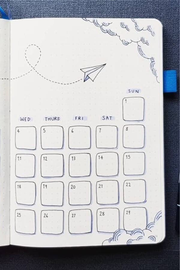 Monthly Spread With Paper Planes