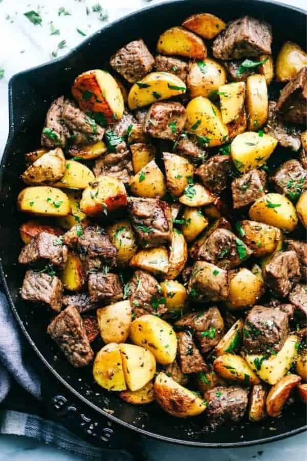 GARLIC BUTTER HERB STEAK BITES WITH POTATOES