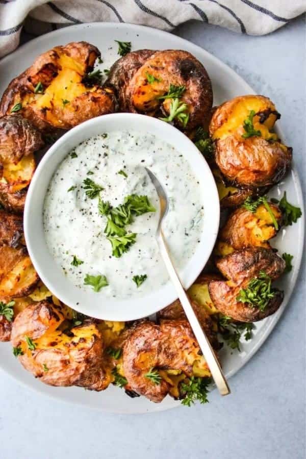 CRISPY SMASHED POTATOES WITH PARSLEY YOGURT SAUCE