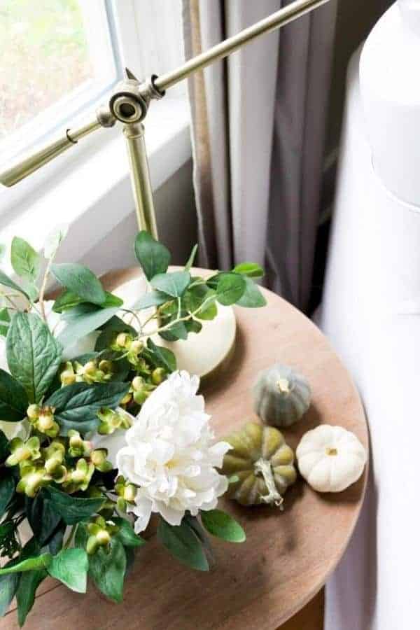 NEUTRAL PUMPKINS AND EUCALYPTUS STEMS