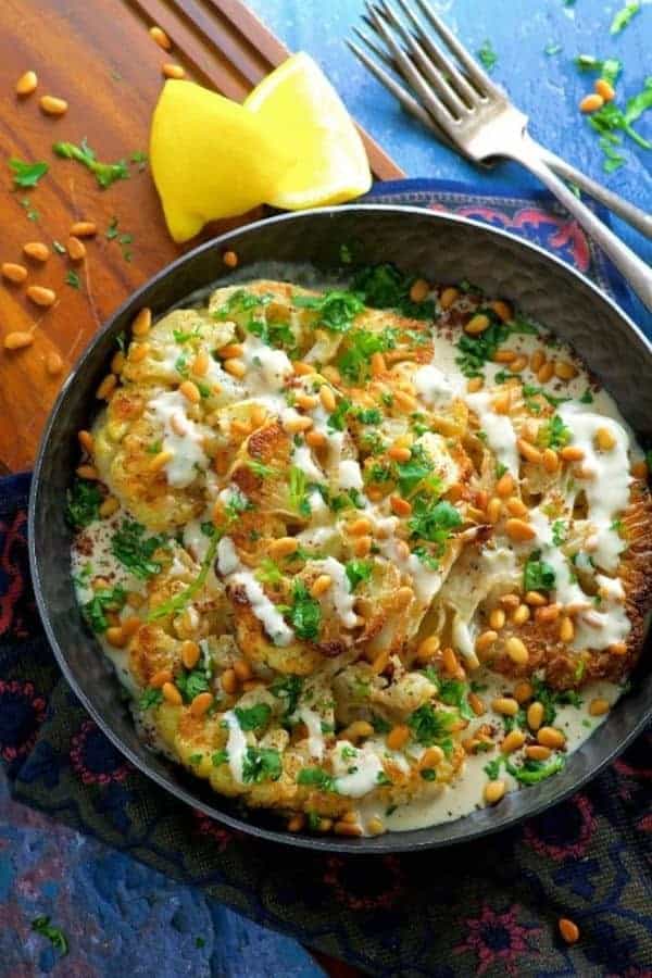 ROASTED CAULIFLOWER STEAKS WITH TAHINI SAUCE