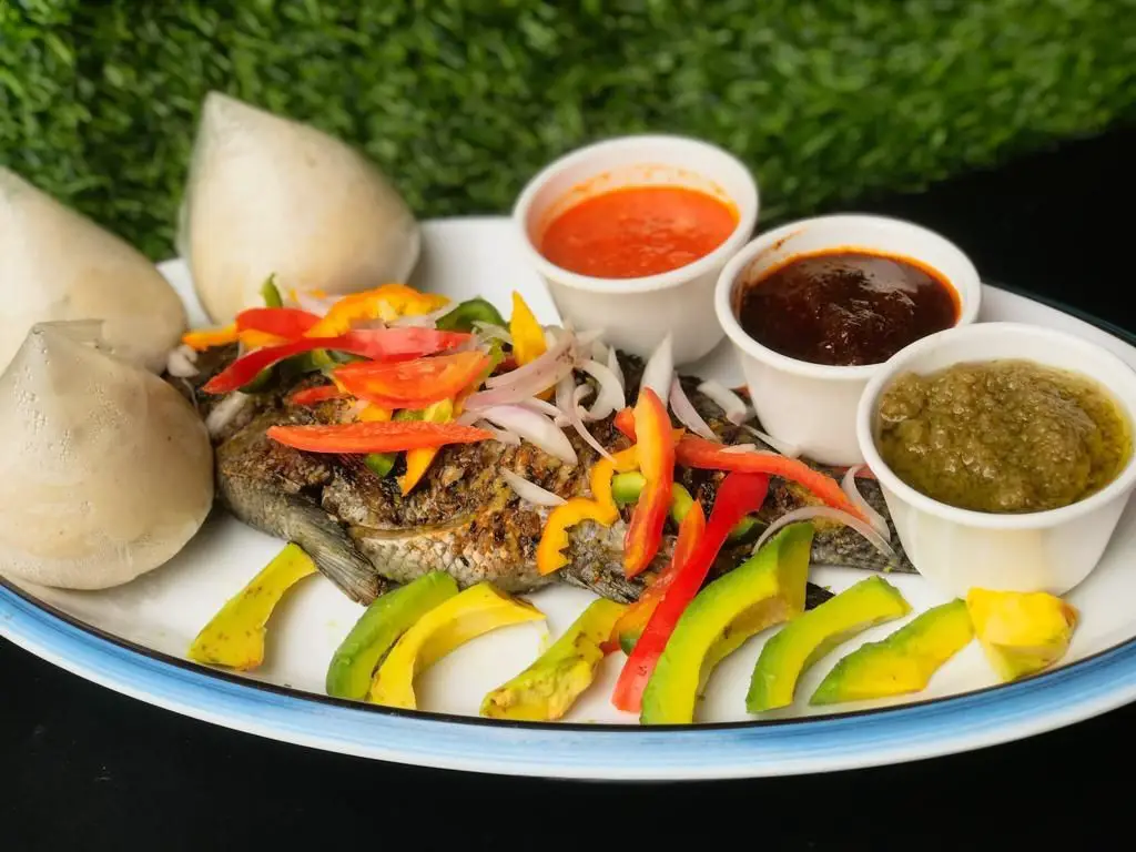 Banku with Tilapia and Pepper Sauce