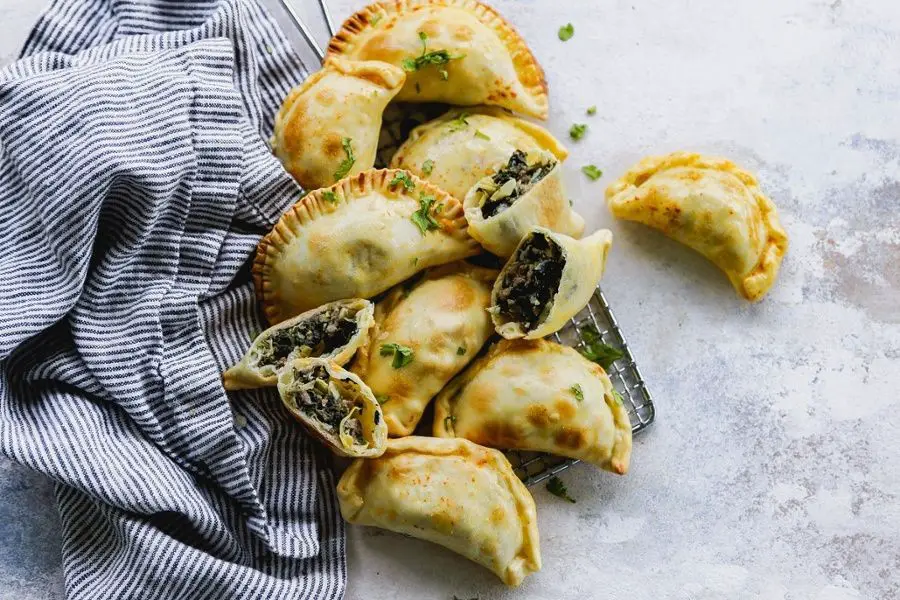 Beef Empanadas with Sautéed Spinach