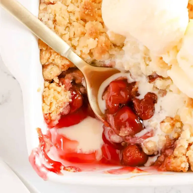 Cherry Cobbler with cherry pie filling, cake mix, and butter.