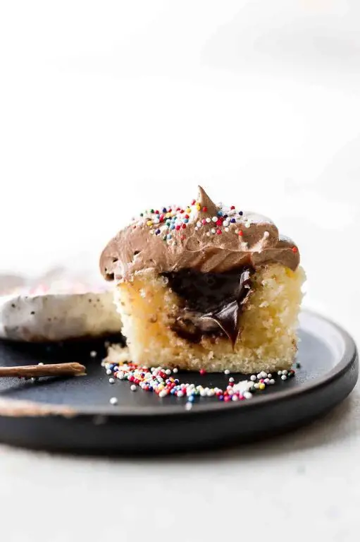 Chocolate Ganache Filled Vanilla Cupcakes
