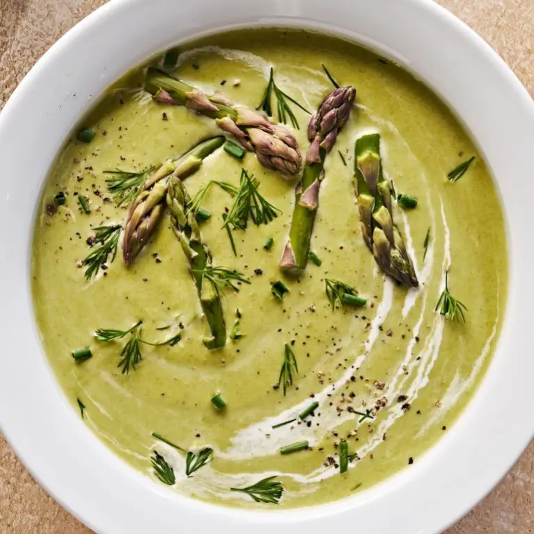 Elegant Asparagus Soup with a drizzle of cream