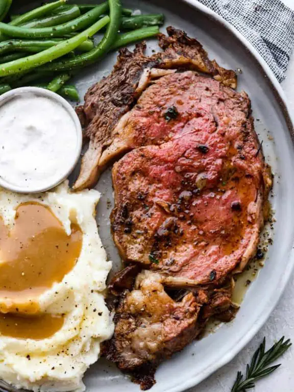 Herb-Crusted Grilled Ribs with Garlic Butter
