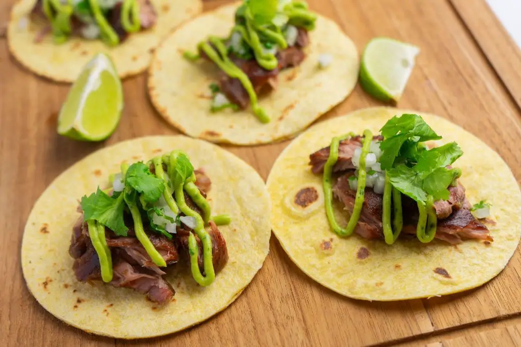 Pork Cheek Tacos with Pickled Onions