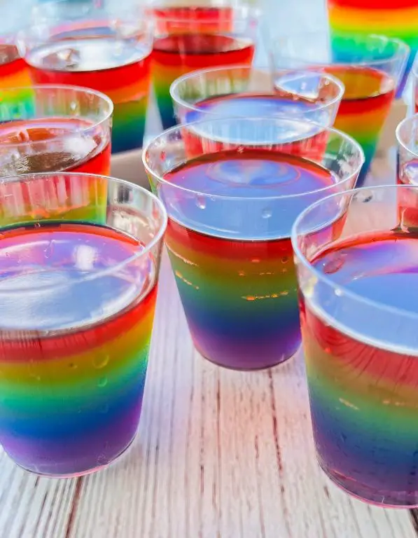 Rainbow Jello Shots: A colorful party favorite.