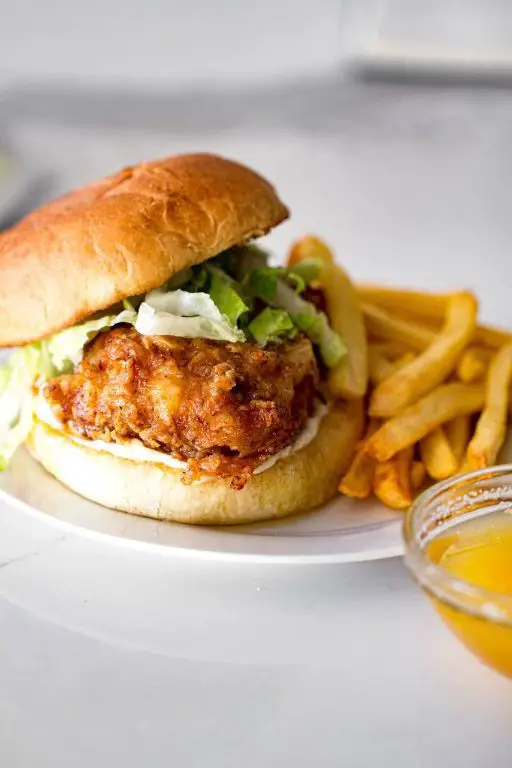 Spicy Honey Butter Chicken Sandwich with Crispy Onions
