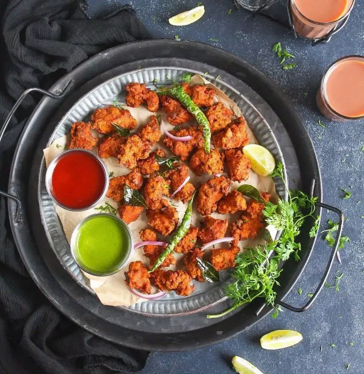 Spicy Schezwan Chicken Pakoras with Sweet Chili Sauce