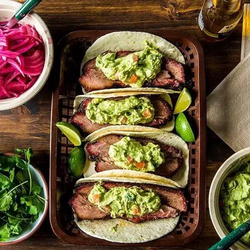 Traeger Smoked Beef Brisket Tacos with Avocado Salsa