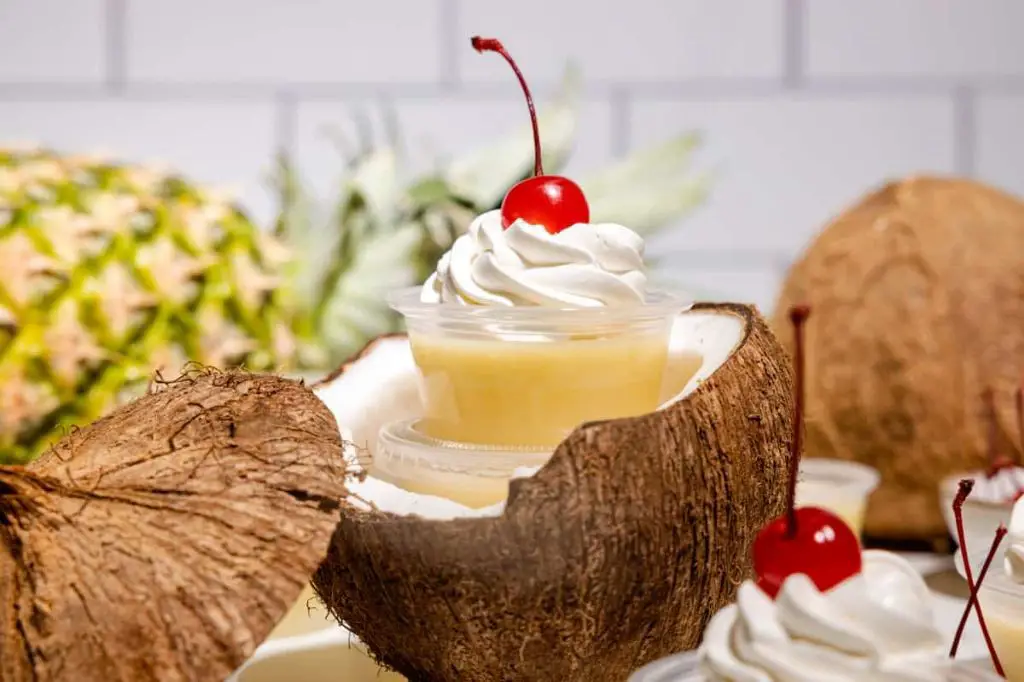 Tropical Jello Shots: Pineapple and coconut delight.