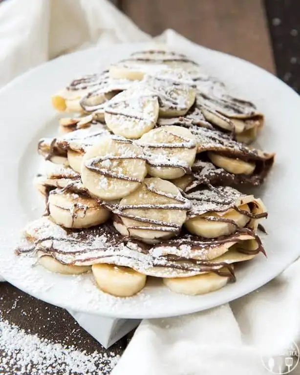 Banana Nutella Blintzes with Powdered Sugar
