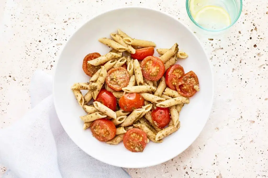 Banza Pasta with Pesto and Cherry Tomatoes