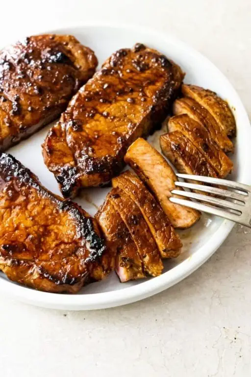 Blackstone Pork Chops with Maple Syrup and Brown Sugar