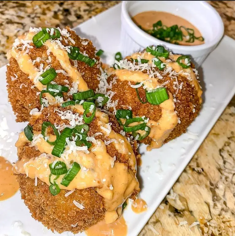 Boudin Balls with Crawfish Cream Sauce