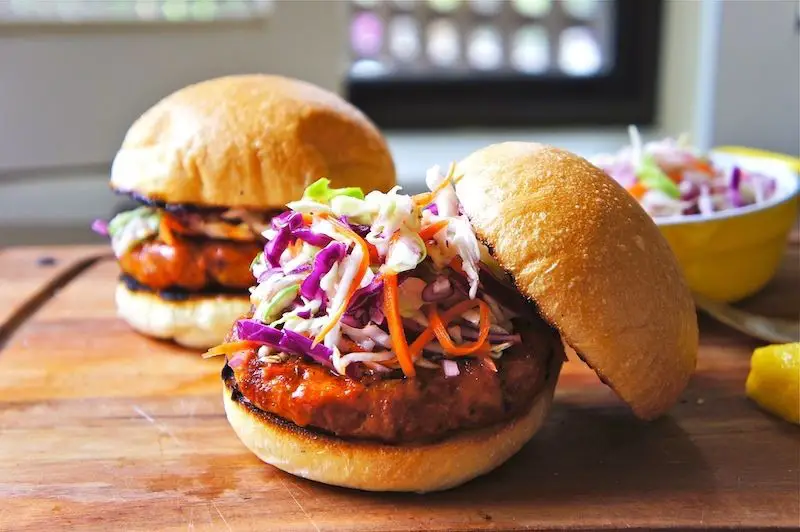 Buffalo Chicken Burgers with Tangy Coleslaw