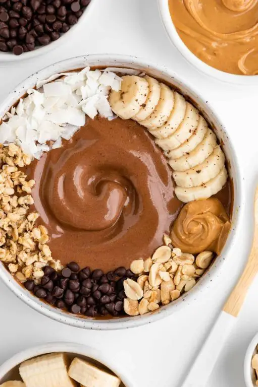 Chocolate Bowl Topped with Peanut Butter and Banana Slices