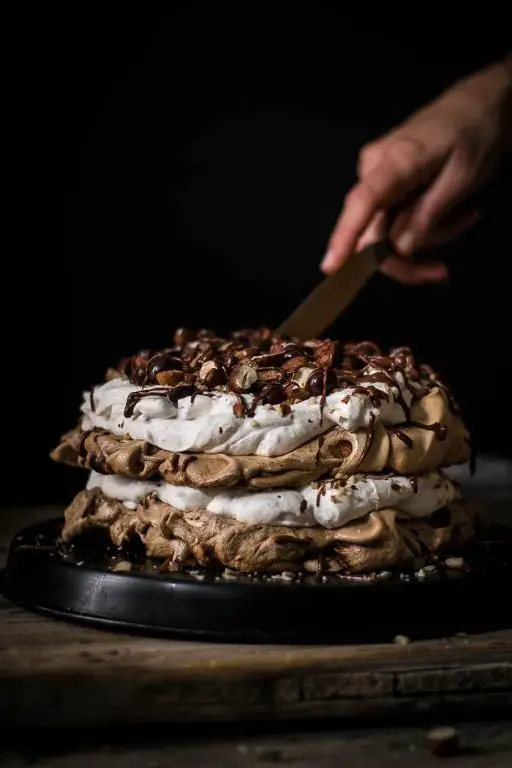 Chocolate Drizzle Pavlova with Hazelnuts