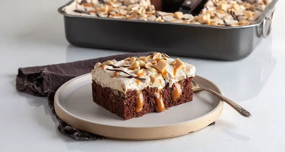 Chocolate Dulce de Leche Poke Cake with Caramel Drizzle