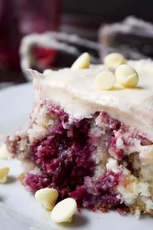 Chocolate Raspberry Poke Cake with Fresh Berries