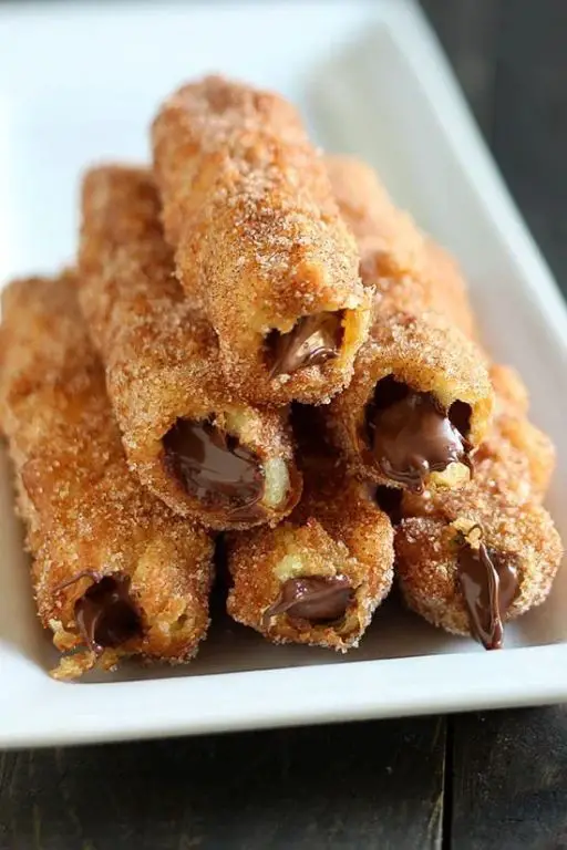 Chocolate-Filled Churros with Whipped Cream