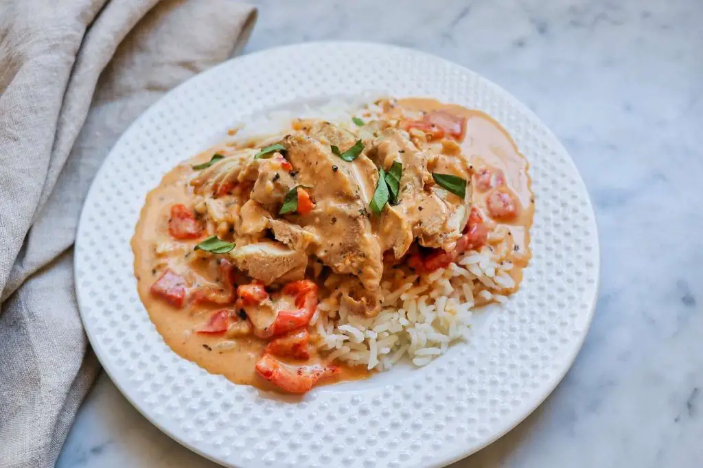 Creamy Cajun Chicken Thighs with Rice