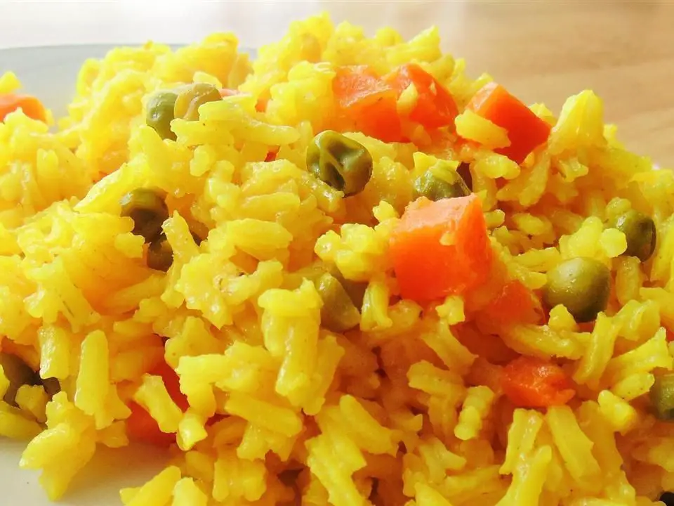 Curried Yellow Rice with Peas and Carrots