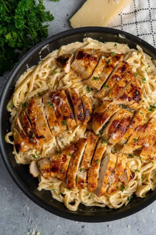 Garlic Parmesan Baked Chicken Breast with Creamy Alfredo Sauce