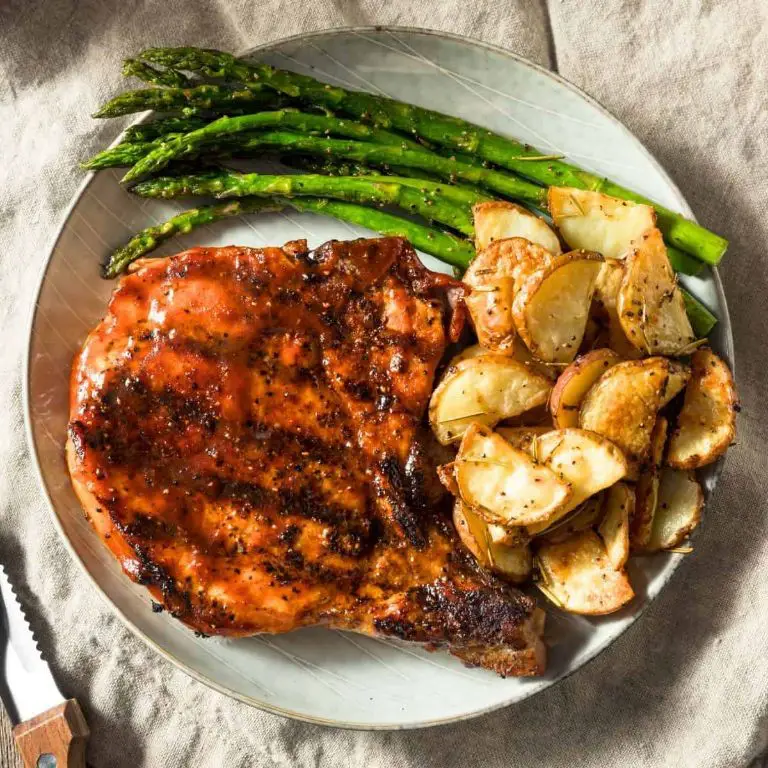 Grilled Blackstone Pork Chops with Garlic Butter
