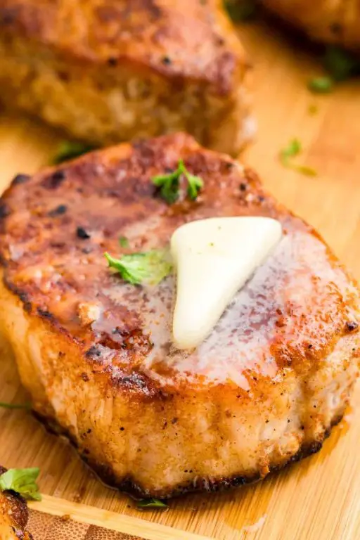 Grilled Blackstone Pork Chops with Herb Butter