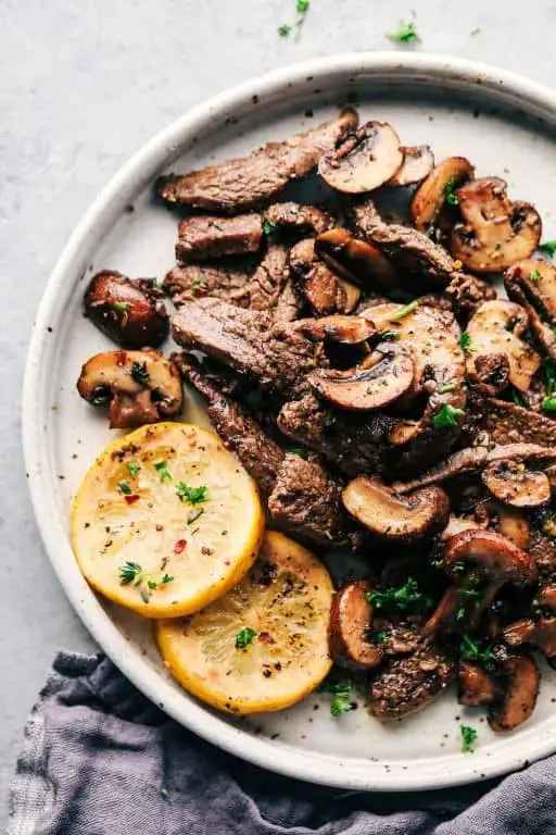 Grilled Flank Steak with Garlic Butter Mushrooms