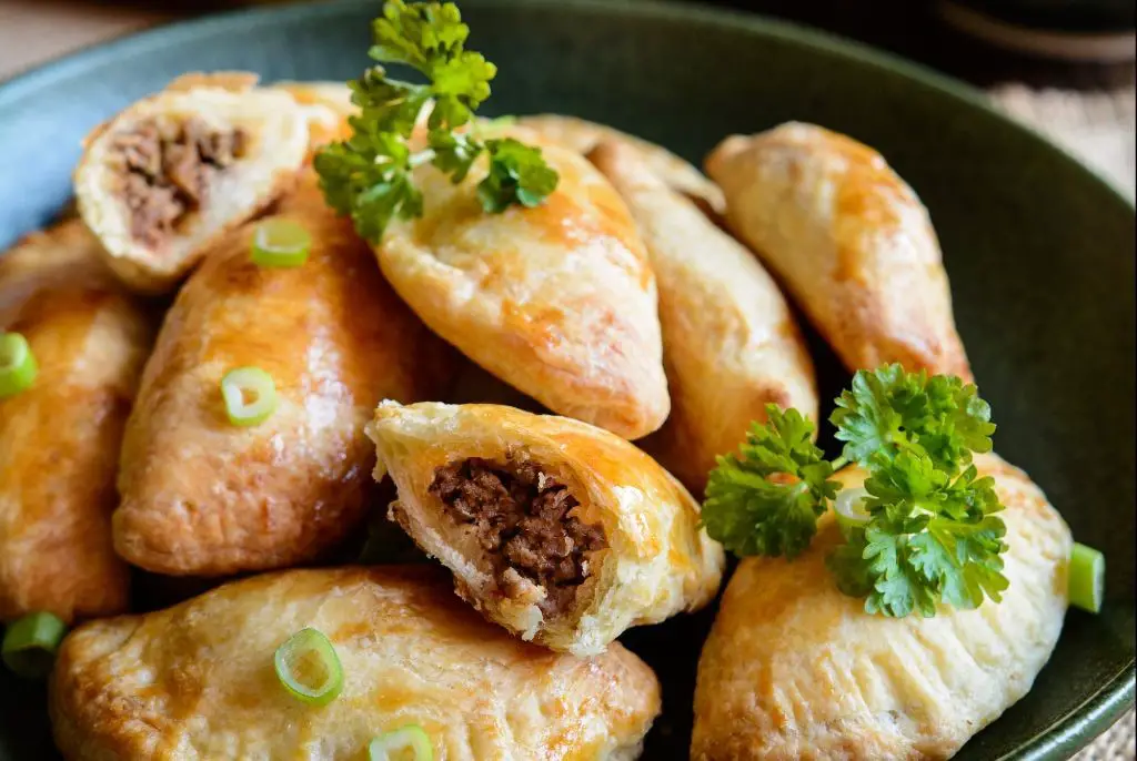 Guinea Pig Empanadas with Spicy Salsa