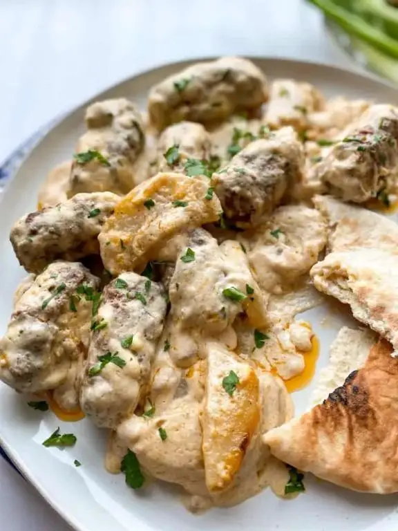Kofta Bil Saniyeh (Baked Kofta with Tahini)