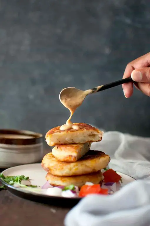 Llapingachos with peanut sauce