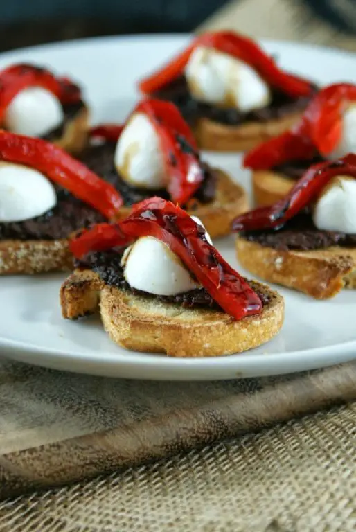 Mozzarella Pearls and Olive Tapenade Crostini