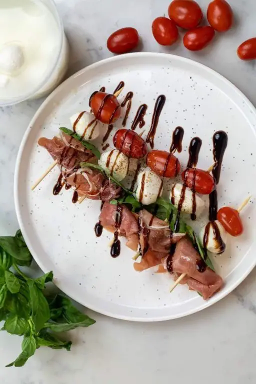 Mozzarella Pearls and Prosciutto Skewers