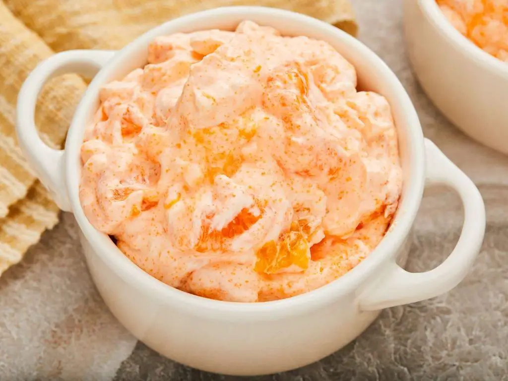 Orange Jello with Mandarin Oranges and Whipped Cream
