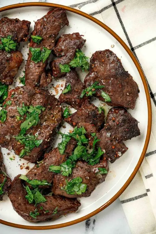 Pan-Seared Beef Heart with Garlic and Rosemary
