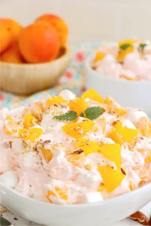 Peach Melba Fruit Salad with Cool Whip Garnish