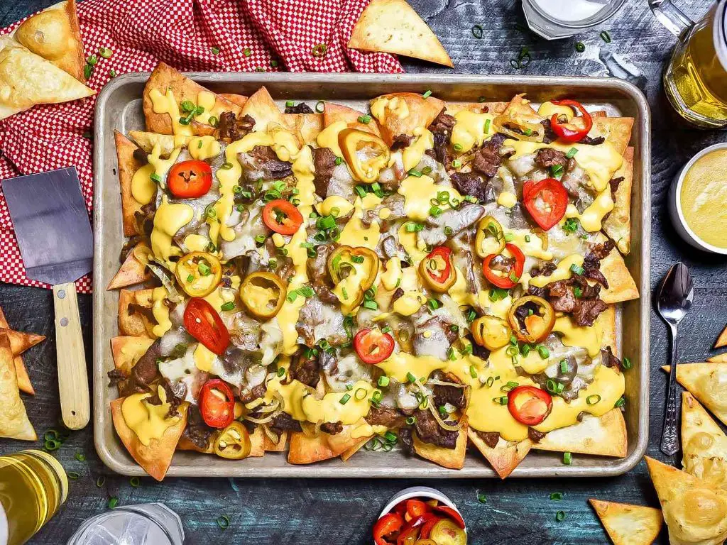 Philly Cheesesteak Nachos with Cheese Sauce
