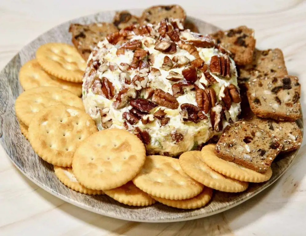 Pineapple Cheeseball with Dried Mango and Chili Flakes