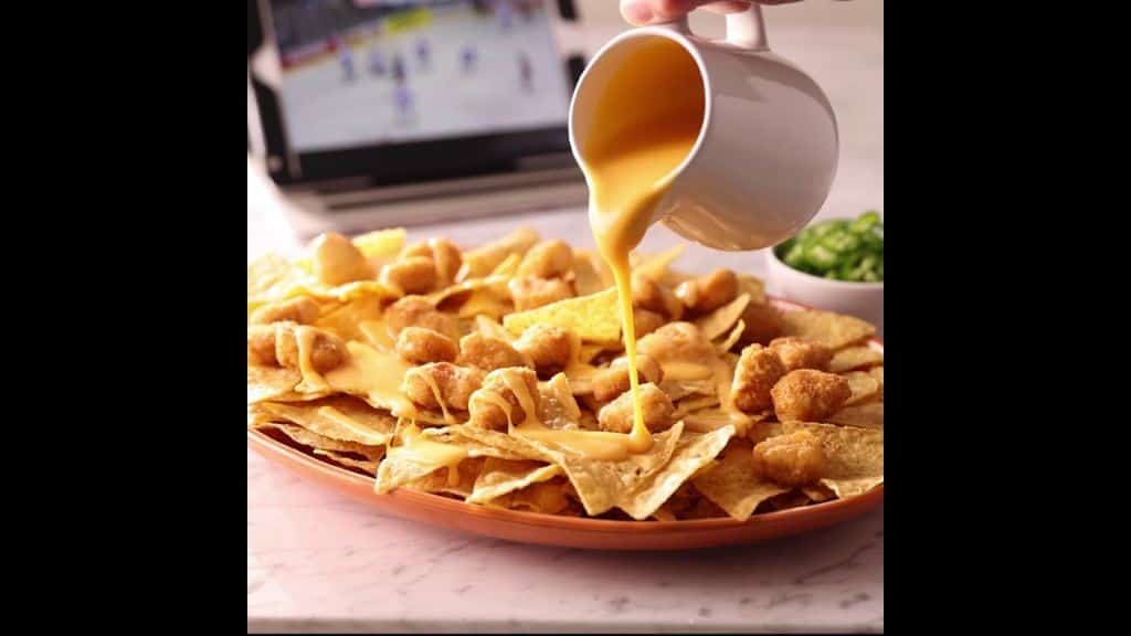 Popcorn Chicken Nachos with Melted Cheese