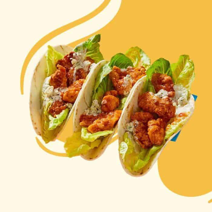 Popcorn Chicken Tacos with Avocado Crema