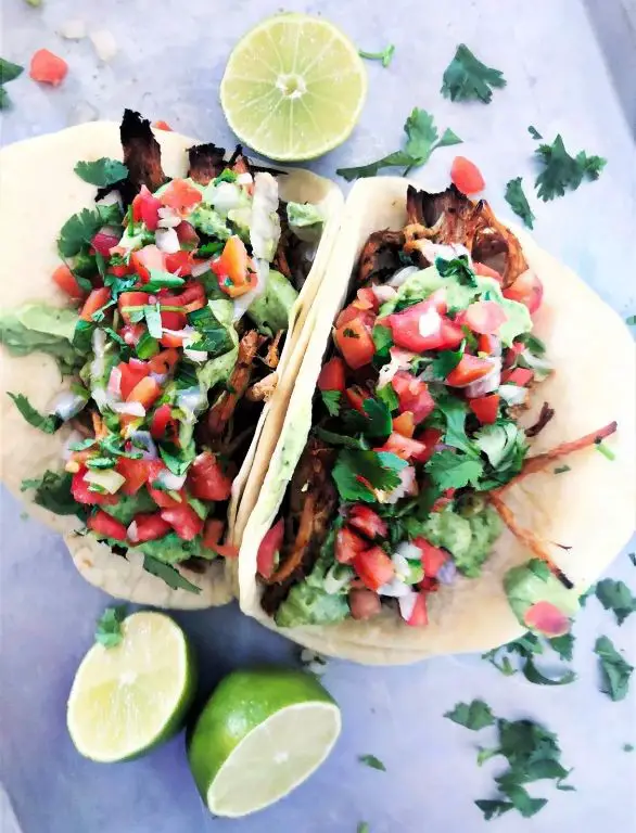 Pork and Avocado Tacos with Lime Crema