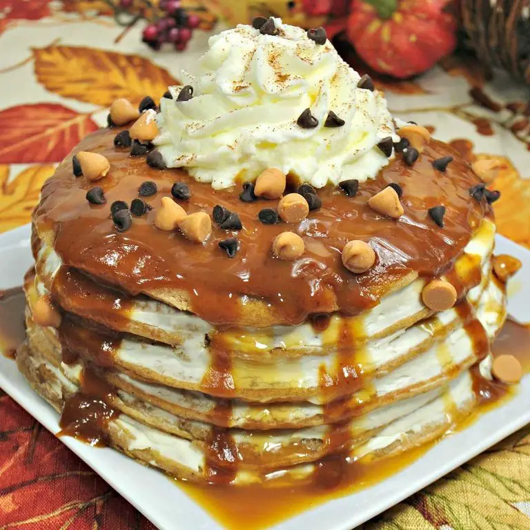 Pumpkin Cheesecake Pancakes with Syrup Drizzle